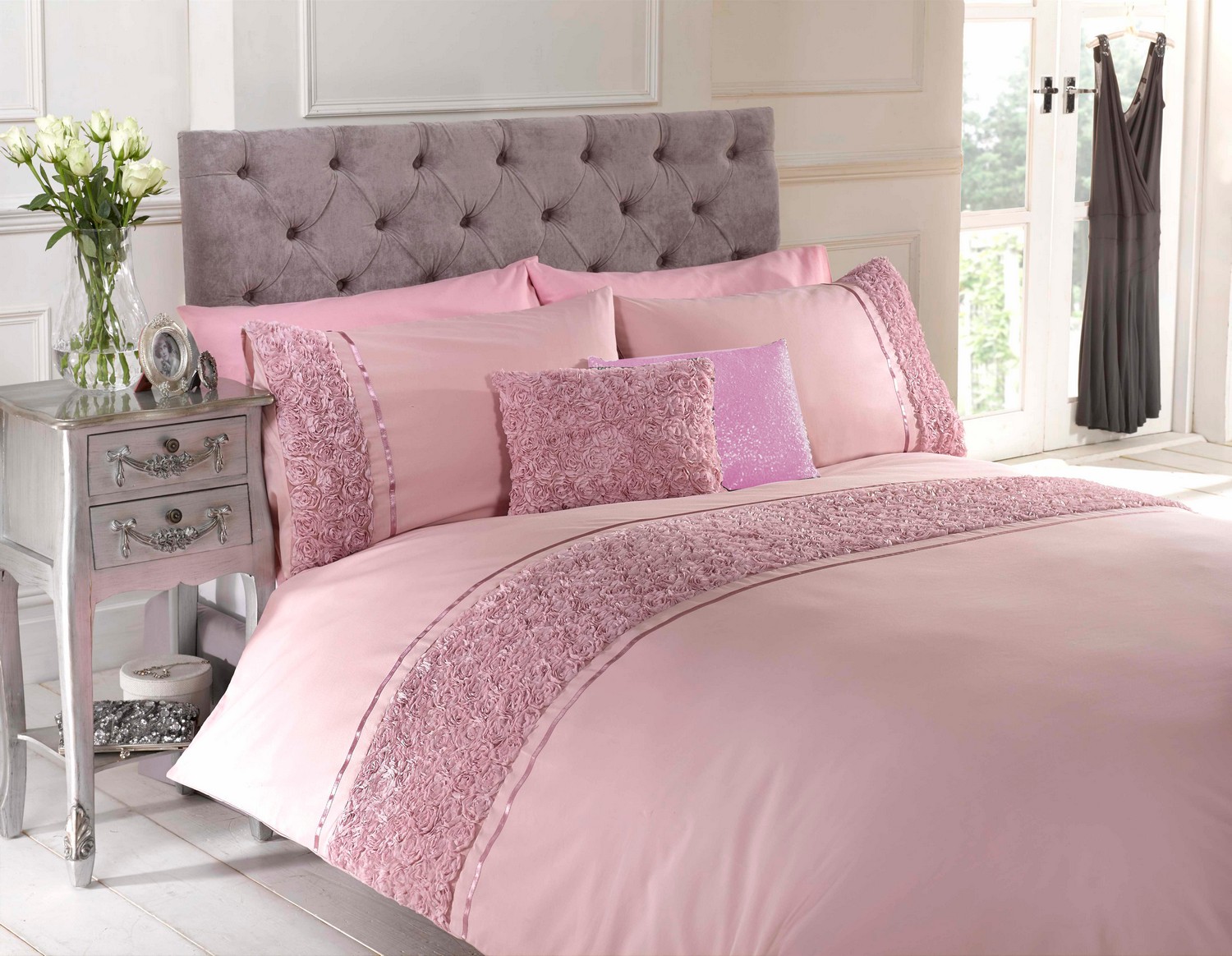 pink double bed with mattress